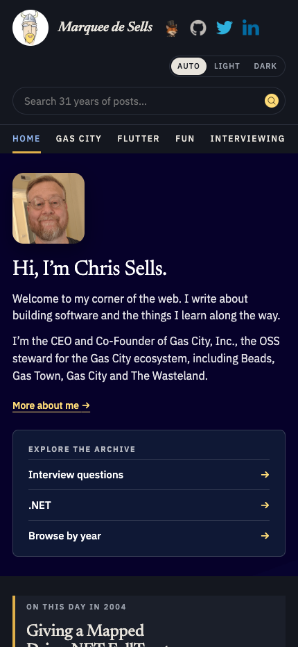 The homepage on a phone in dark appearance, with search on its own row and horizontally scrolling topics.